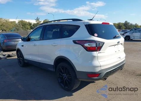 2017 Ford Escape Titanium z USA, uszkodzony, nr VIN 1FMCU0J90HUB29788
